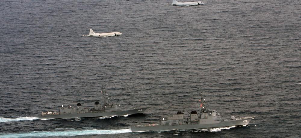 An 11 Squadron AP-3C Orion joins its Japanese counterpart in a flypast of two Japanese military ships. TITLE: Goodwill visit to Japan by 11 Squadron