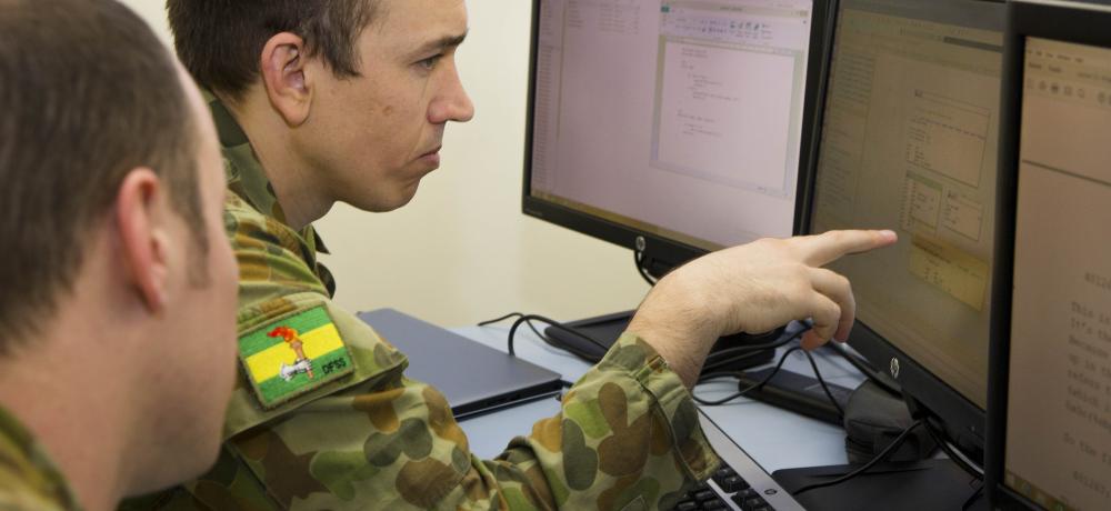 Lance Corporal Anthony Neale, of the Defence Force School of Signals, studies cyber defence operations while attending the University of New South Wales Canberra Cyber Operations course run by the Australian Centre for Cyber Security at Australian Defence Force Academy in Canberra.