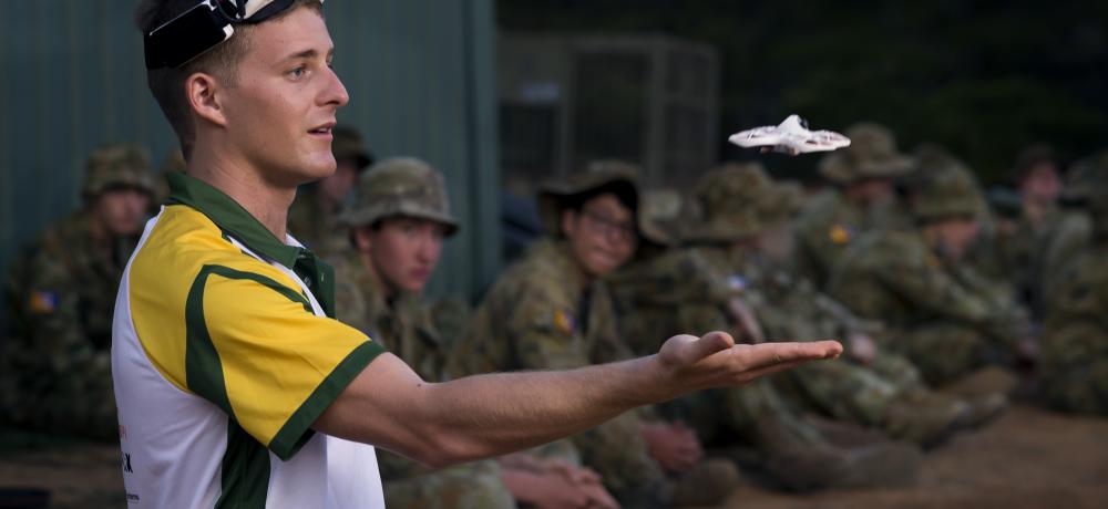 Australian Army Drone Racing Team member, Craftsman Jayce Holland demonstates a training drone to Australian Army Cadets at Majura Range, Canberra.