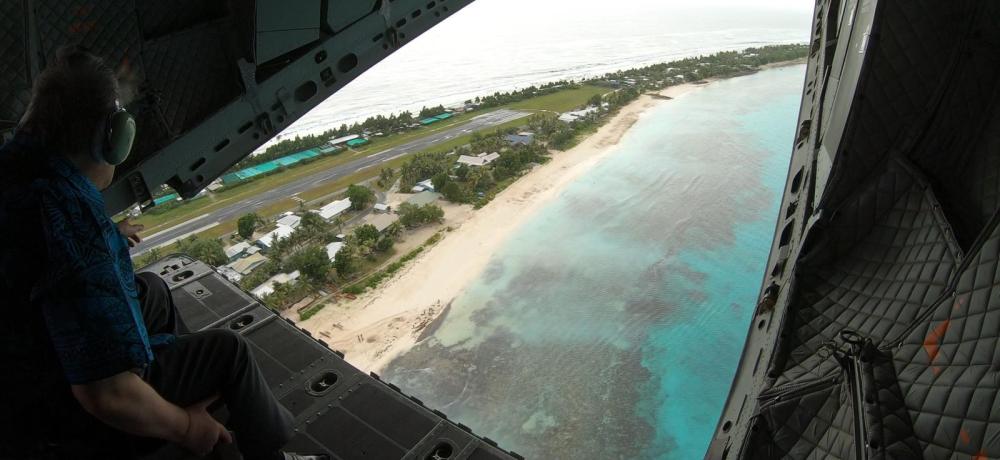 United Nations Secretary General, António Guterres, viewing islands of the South West Pacific nation of Tuvalu from the ramp of a No. 35 Squadron C-27J Spartan.