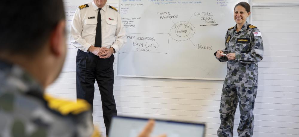 Commander Paul Davidson and Lieutenant Commander Jane Tsakssiris participates in a group discussion with Reserve Entry Officers at HMAS Creswell.