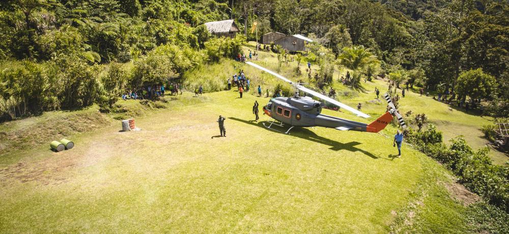 Members of the Isurava community and Papua New Guinea Defence Force farewell the Australian delgation after a visit to the Isurava memorial during the Anzac Day 2022 commemorations in Papua New Guinea.