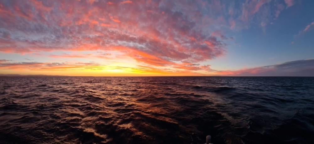 Image of a sunset over the ocean