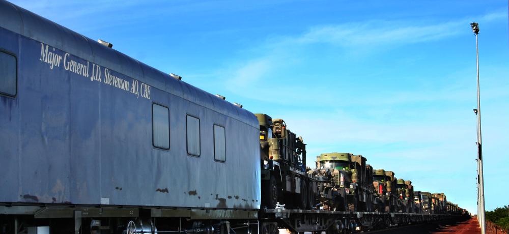 Crew-van prepares to depart Berrimah Railyard for South Australia with fully laden rail waggons carrying 1st Brigade vehicles for Exercise Southern