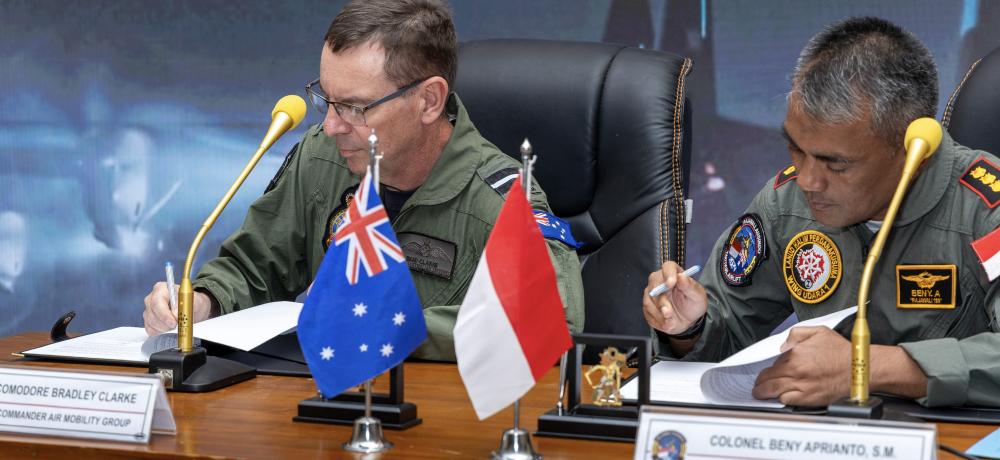 Commander Air Mobility Group, Air Commodore Bradley Clarke, CSC, OAM signs the sister squadron agreement alongside 1st Wing Commander Colonel Beny Aprianto, S.M