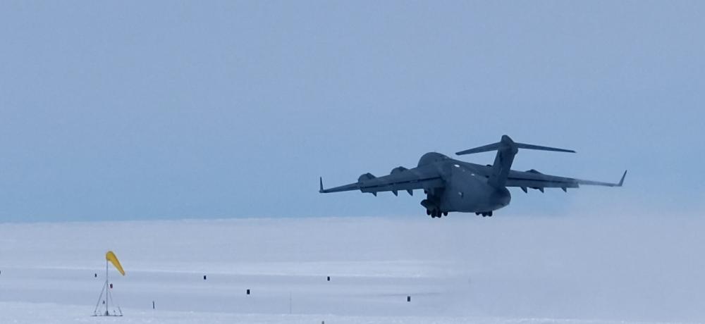 A RAAF C-17A Globemaster III from no. 36 Squadron departs from Wilkins Aerodrome