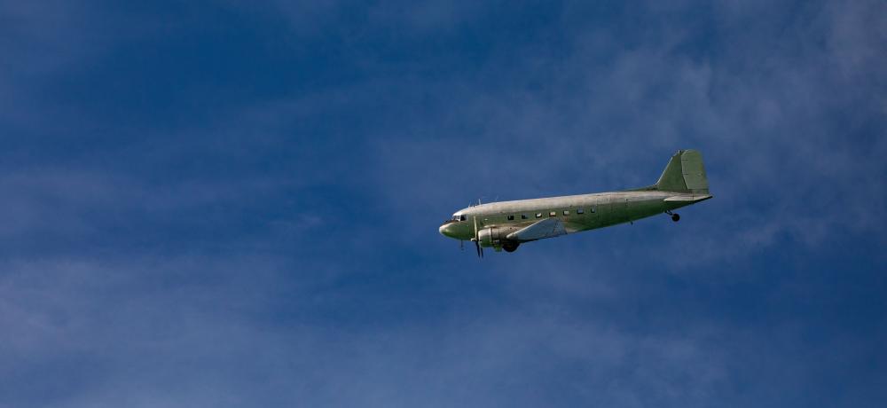 A Douglas DC-3 aircraft conducts a fly past during the Bombing of Darwin Commemorative Ceremony held at the Darwin Cenotaph, NT.