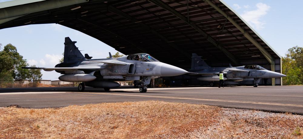 Two Royal Thai Air Force JAS-39 Gripen C depart RAAF Base Darwin for sorties during Exercise Pitch Black 24.