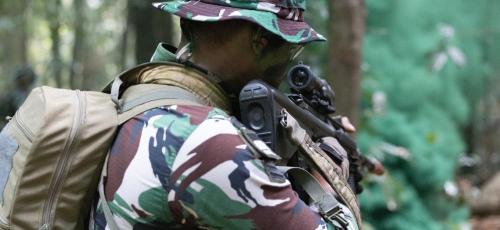 Indonesian Army soldiers (Tentara Nasional Indonesia) participating in a section attack at the Junior Officer Combat Instructor Training Course held in Tully, November 2024. Mid Caption: