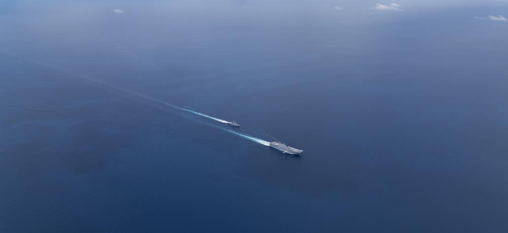 HMAS Adelaide and HMAS Stuart sail together as part of the ship's Indo-Pacific Endeavour deployment.