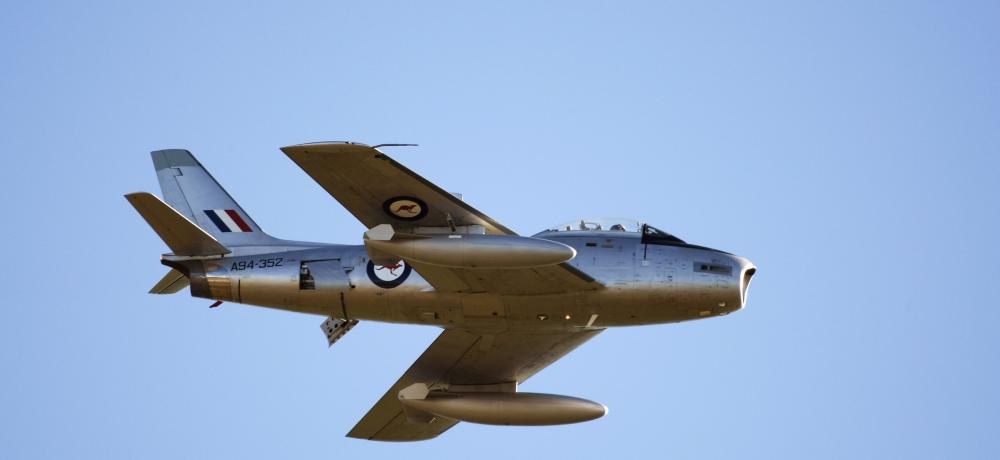 Sabre aircraft thunders through the sky during the Wings Over Illawarra Air Show.