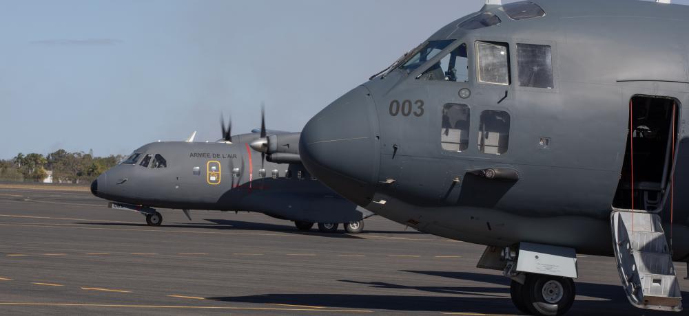 A French Air and Space Force CASA CN-225 taxiing beside a No. 35 Squadron C-27J Spartan at Bundaberg Airport, Queensland.