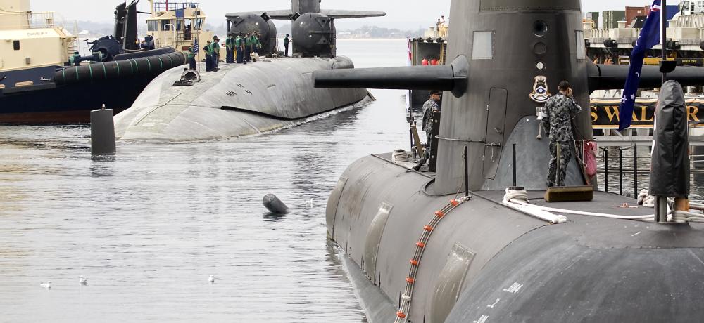 Ohio Class Cruise Missile Submarine (SSGN), USS Ohio berths alongside Diamantine Pier, Fleet Base West, HMAS Stirling with Collins Class Submarine, HMAS Waller in the foreground.