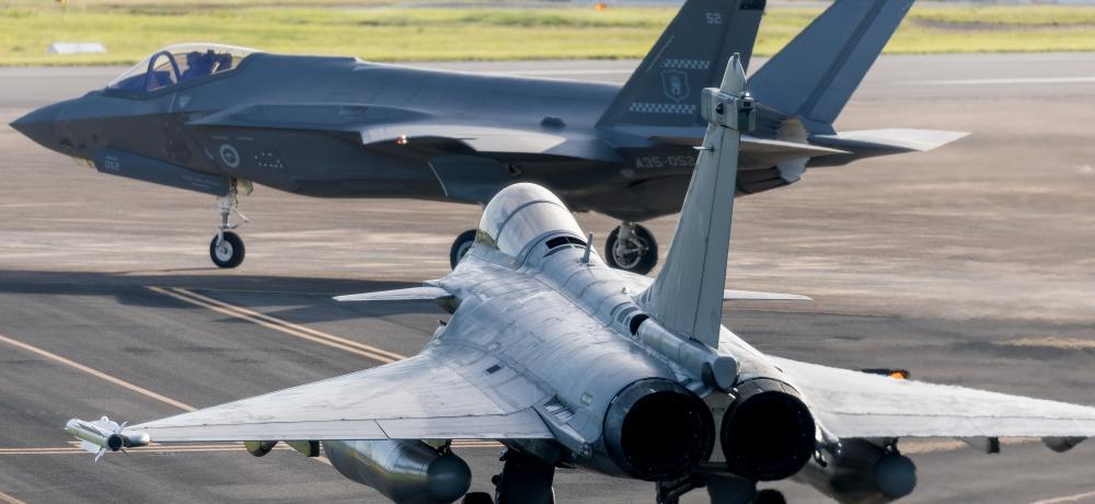 A Royal Australian Air Force F-35A Lightning II and French Navy Rafale M taxi out for a sortie at RAAF Base Darwin for Exercise Rastaban 25.