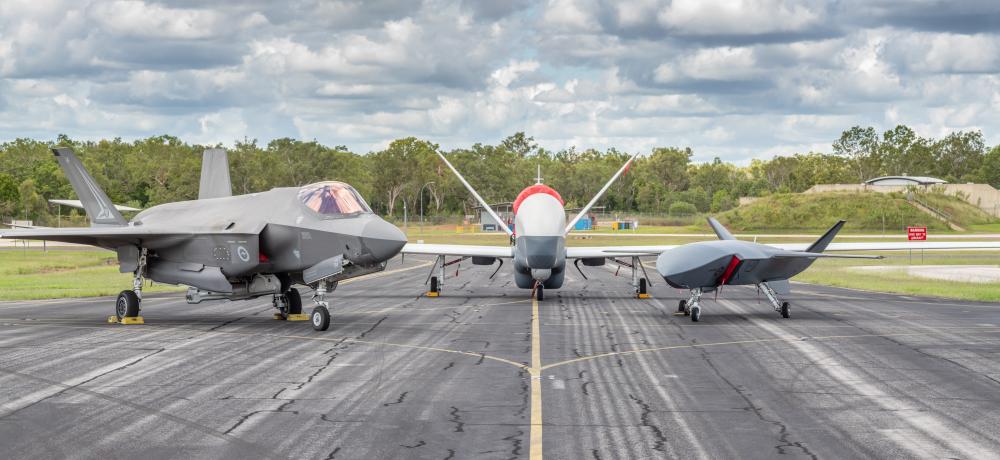 A F-35A Lightning II, MQ-4C Triton and MQ-28A Ghost Bat on the tarmac during Exercise Carlsbad at RAAF Base Tindal.