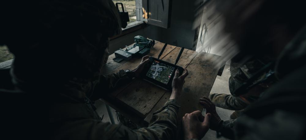 Australian Army soldier assists Armed Forces of Ukraine personnel with drone support during an urban assault on a village, as part of Operation Kudu Rotation 10 in the United Kingdom.