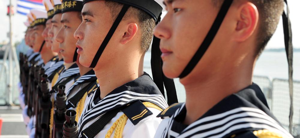 Chinese Navy sailors onboard PLA Navy Ship Sanya alongside South China Sea Fleet Navy Base in Zhanjiang.