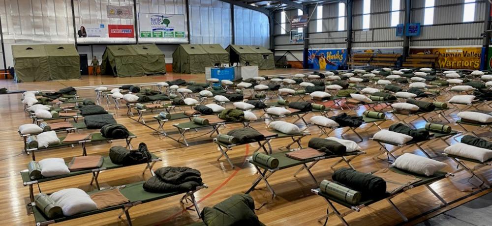 Members from 13th Brigade and the Pilbara Regiment set up temporary camp style accommodation in Geraldton Western Australia, to provide a place to sleep and rest for up to 100 Department of Fire and Emergency Services (DFES) personnel.