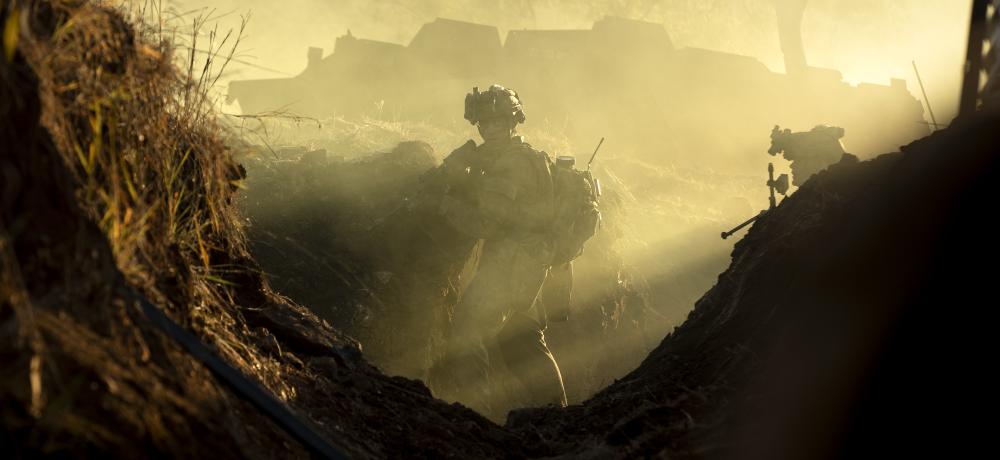 Australian Army soldiers from 3rd Battalion, The Royal Australian Regiment conduct an assault on the enemy main defensive position during Exercise Brolga Run 23 at Townsville Field Training Area,