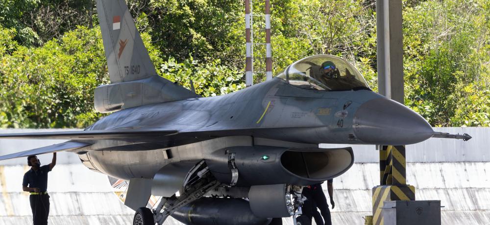 Ground crew conduct a pre-flight check on an Indonesian Air Force F-16 Fighting Falcon aircraft prior to departure during Exercise ELANG AUSINDO, Indonesia, 2025.