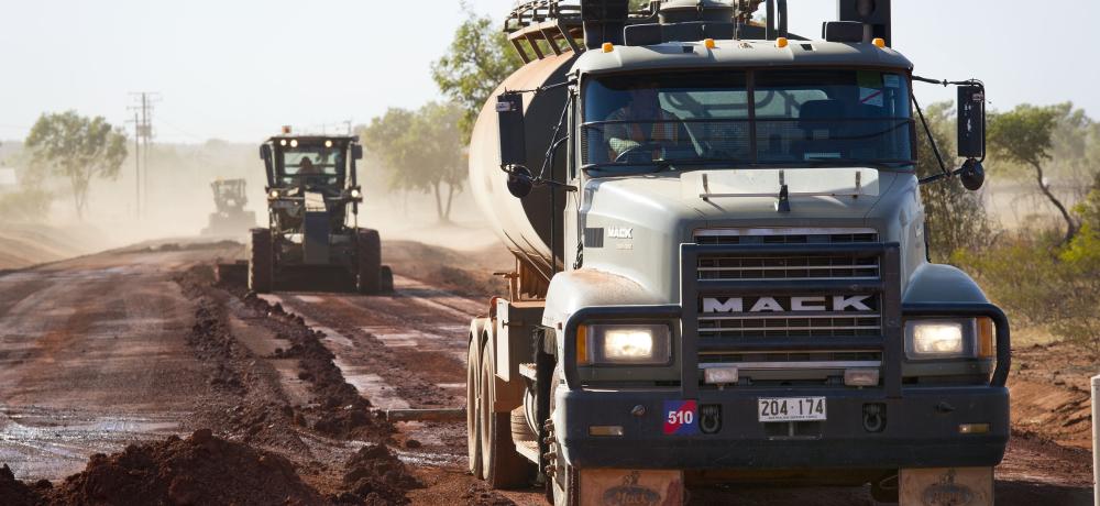 Australian Army heavy vehicles constructing a road.