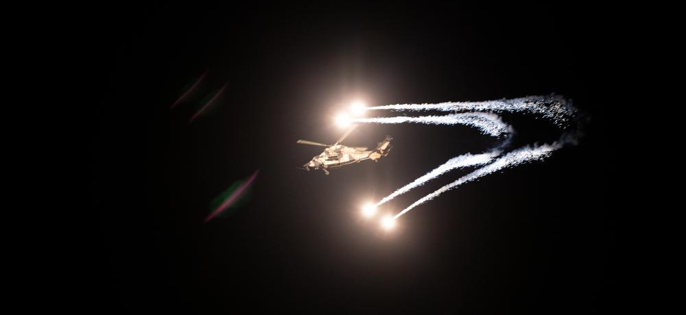 Australian Army ARH Tiger launches countermeasures during a live fire exercise as part of Griffin Guns at Mount Bundey training area at the Northern Territory.
