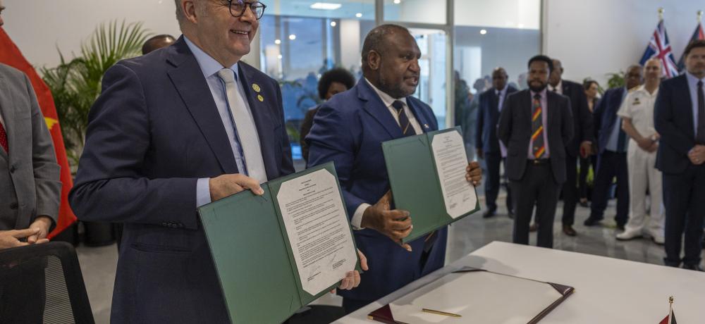 Australian Prime Minister the Honourable Anthony Albanese, MP, and Papua New Guinea Prime Minister James Marape, MP, stand together after signing the Joint Communique on a Mutual Defence Treaty at Melanesian Haus, Waigani, on 17 September 2025.