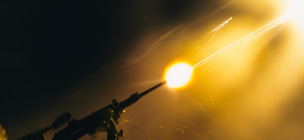 Heavy Machine Gun firing at night 