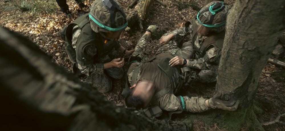 Armed Forces of Ukraine soldiers conduct first aid 