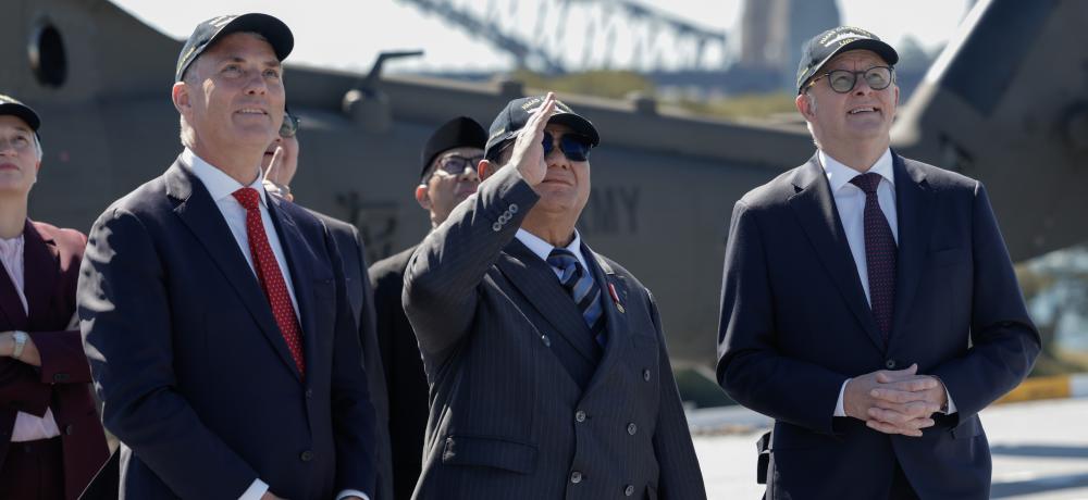 Richard Marles MP, the President of the Republic of Indonesia, His Excellency Prabowo Subianto and Anthony Albanese MP on HMAS Canberra