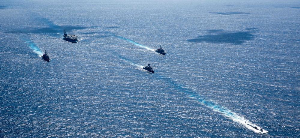 USS Ronald Reagan in formation with  HMAS Perth and others