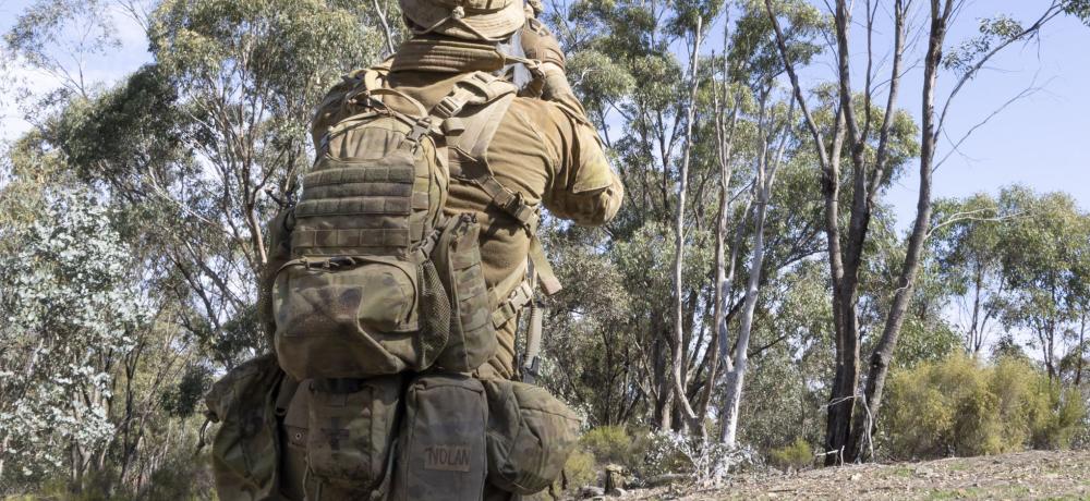 Australian Army soldier takes aim at a drone.