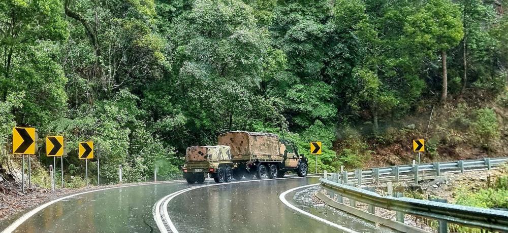 Vehicles and soldiers of the 5th Brigade cross the Brown Mountains between Bega and Cooma 