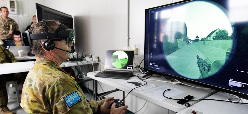 ADF personnel trail the Autonomous Patrol Member during The Technical Cooperation Program AI Strategic Challenge 2023