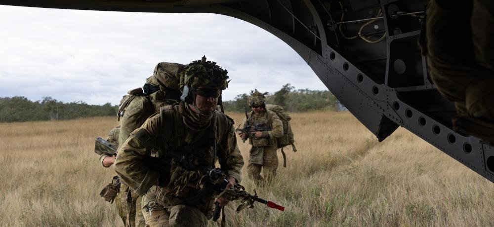 Soldiers from 4th Regiment Royal Australian Artillery embark a CH-47F Chinook 