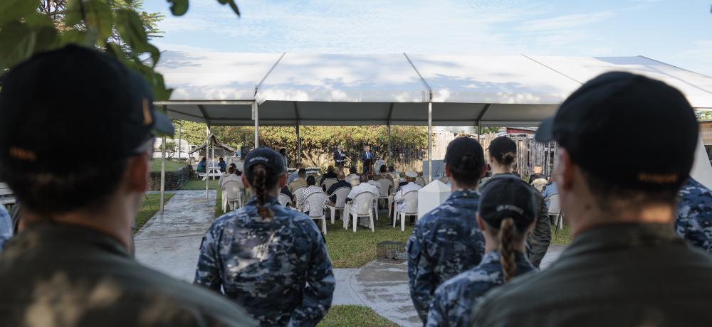 No. 35 Squadron watch the speeches during the HMAS Canberra I Memorial.