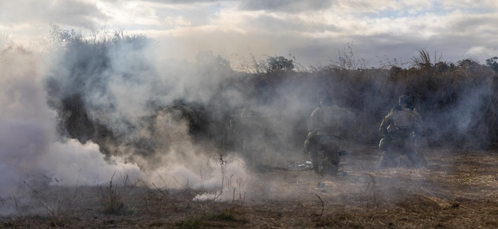 1st Royal Australian Regiment fit masks during a chemical, biological, radiological and nuclear defence (CBRND) serial.