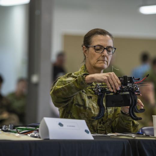 Director-General Special Operations Modernisation Australian Army officer Brigadier Joanne Whittaker inspects an unmanned aerial vehicle with a universal mounting bracket designed by participants in the 2nd Commando Regiment Innovation and Experimentation Group Maker Week during the leadership day… read more