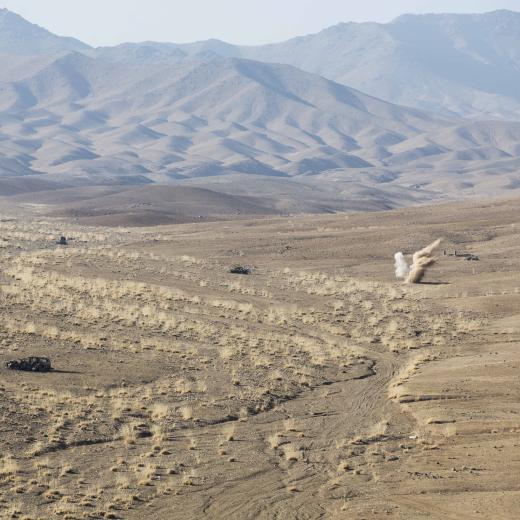 A bomb dropped by an A-29 Super Tucano strikes its target during a Tactical Air Coordinators exercise near Kabul, Afghanistan.