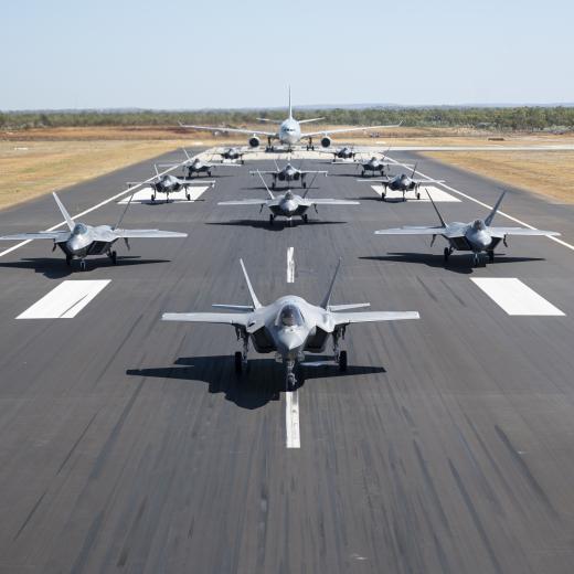 U.S. Air Force F-22A Raptors assigned to the 27th Expeditionary Fighter Squadron along with Royal Australian Air Force F-35A Lightning IIs from No 75 Squadron and a KC-30A Multi Role Tanker Transport aircraft from No 33 Squadron, demonstrate a show of force by conducting an elephant walk at RAAF Base Tindal, Australia,