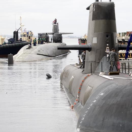 Ohio Class Cruise Missile Submarine (SSGN), USS Ohio berths alongside Diamantine Pier, Fleet Base West, HMAS Stirling with Collins Class Submarine, HMAS Waller in the foreground.