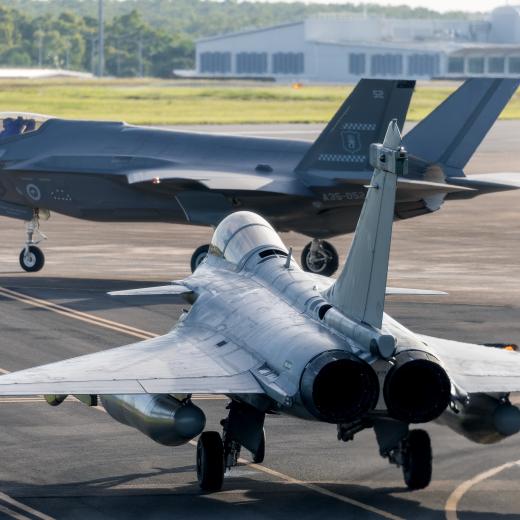 A Royal Australian Air Force F-35A Lightning II and French Navy Rafale M taxi out for a sortie at RAAF Base Darwin for Exercise Rastaban 25.