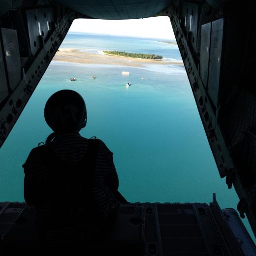 Personnel from the Australian High Commission – Tonga, on board a Royal Australian Air Force C-27J Spartan aircraft during Operation Solania 25-2.