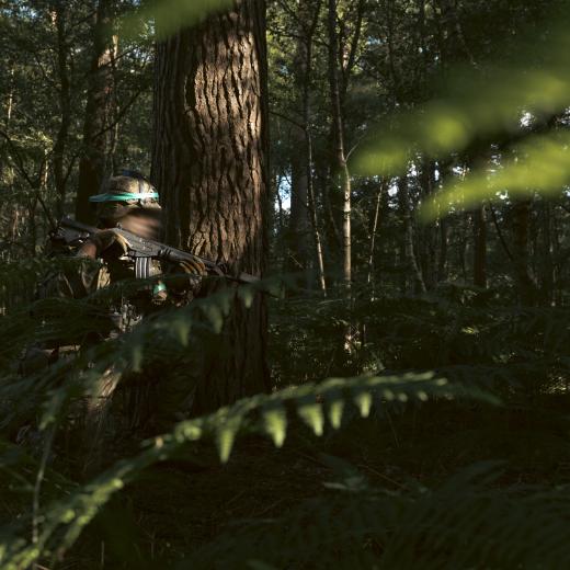 An Armed Forces of Ukraine soldier patrols before conducting a trench clearance serial as part of OP KUDU Rotation 10 in the United Kingdom.