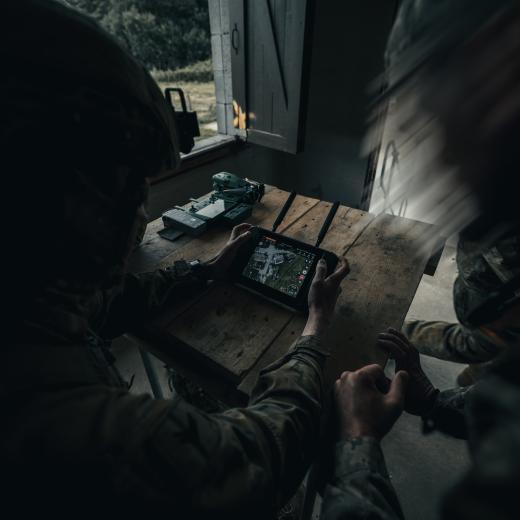 Australian Army soldier assists Armed Forces of Ukraine personnel with drone support during an urban assault on a village, as part of Operation Kudu Rotation 10 in the United Kingdom.