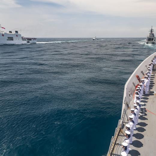 Personnel from HMAS Hobart prepare to salute Indonesian Navy Hospital Ship Dr Radjiman W.-992, during the Indonesian International Fleet Review 2025, off the coast of Bali, Indonesia.