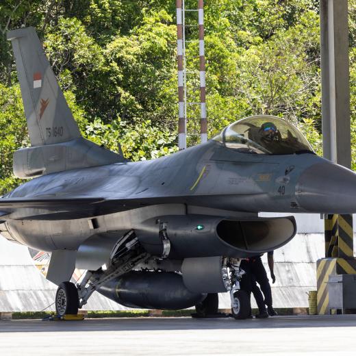 Ground crew conduct a pre-flight check on an Indonesian Air Force F-16 Fighting Falcon aircraft prior to departure during Exercise ELANG AUSINDO, Indonesia, 2025.