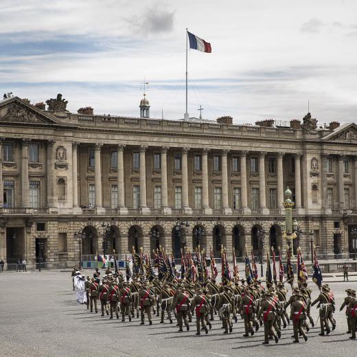 Australian Defence Force personnel march down the Avenue des Champs-Élysées