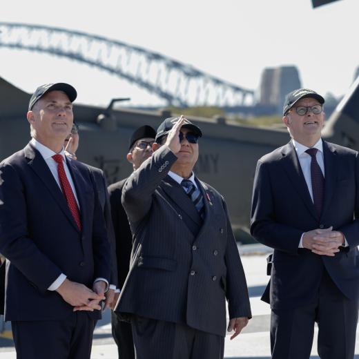 Richard Marles MP, the President of the Republic of Indonesia, His Excellency Prabowo Subianto and Anthony Albanese MP on HMAS Canberra