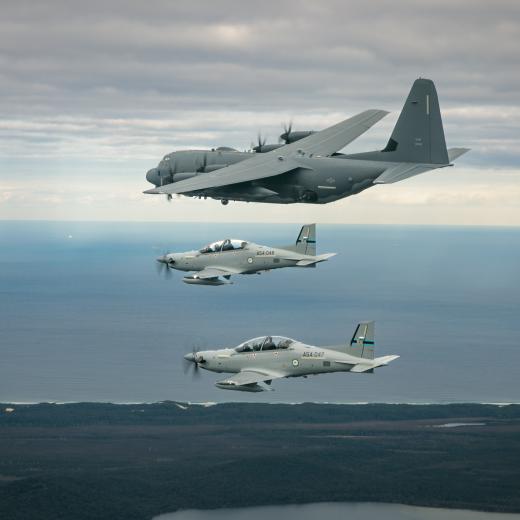 Two Royal Australian Air Force PC-21 with the United States Air Force AC-130J Ghostrider aircraft 